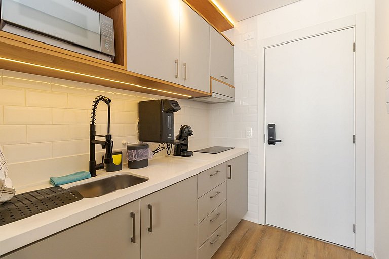 Studio moderno com rooftop e vista incrível