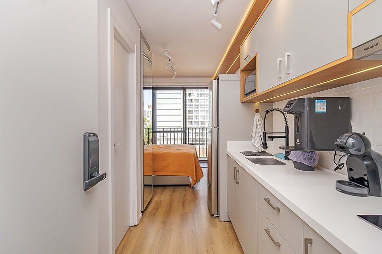 Studio moderno com rooftop e vista incrível
