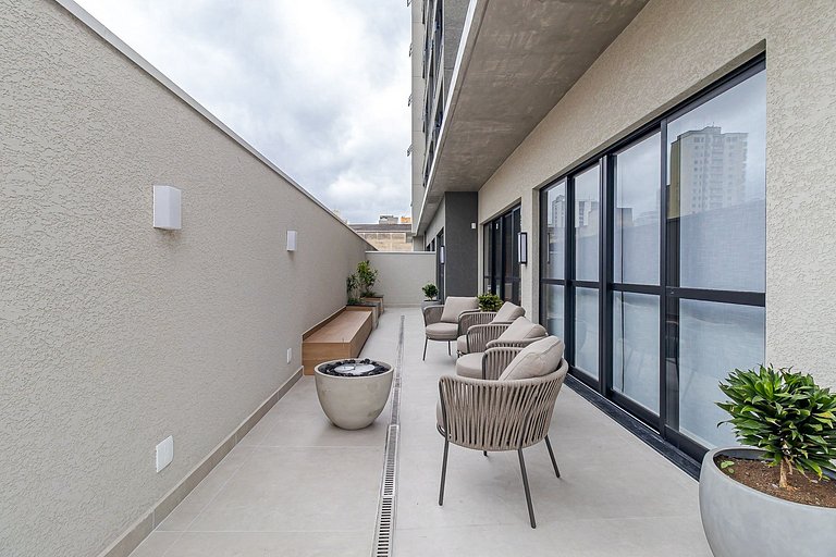 Studio moderno com rooftop e vista incrível
